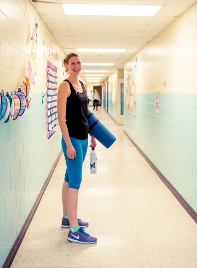 Rebecca carrying yoga mat