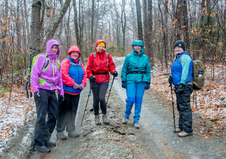 Susan hiking with path