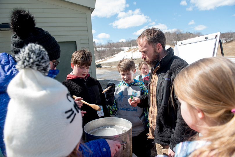 Andrew with students boiling