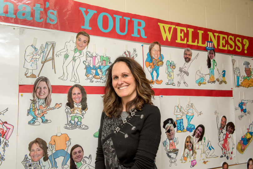 Tracy with cartoon sign