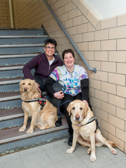 lisaB with dogs on steps